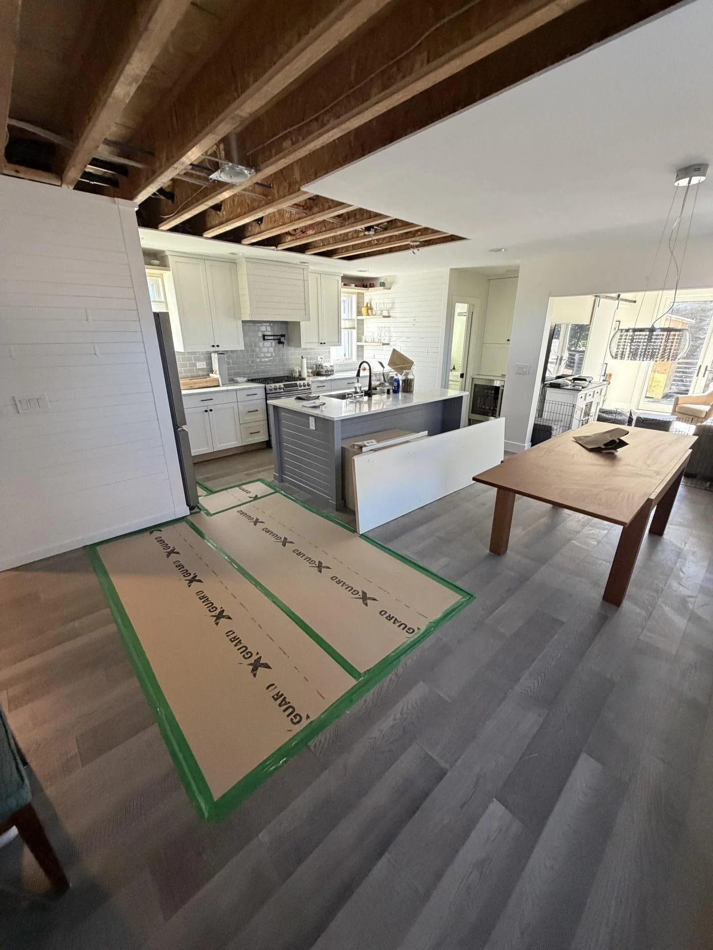 After: Washing machine backup above the kitchen - a three-story loss.